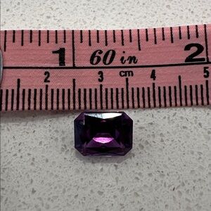 Genuine Amethyst Gemstone in rich violet color.